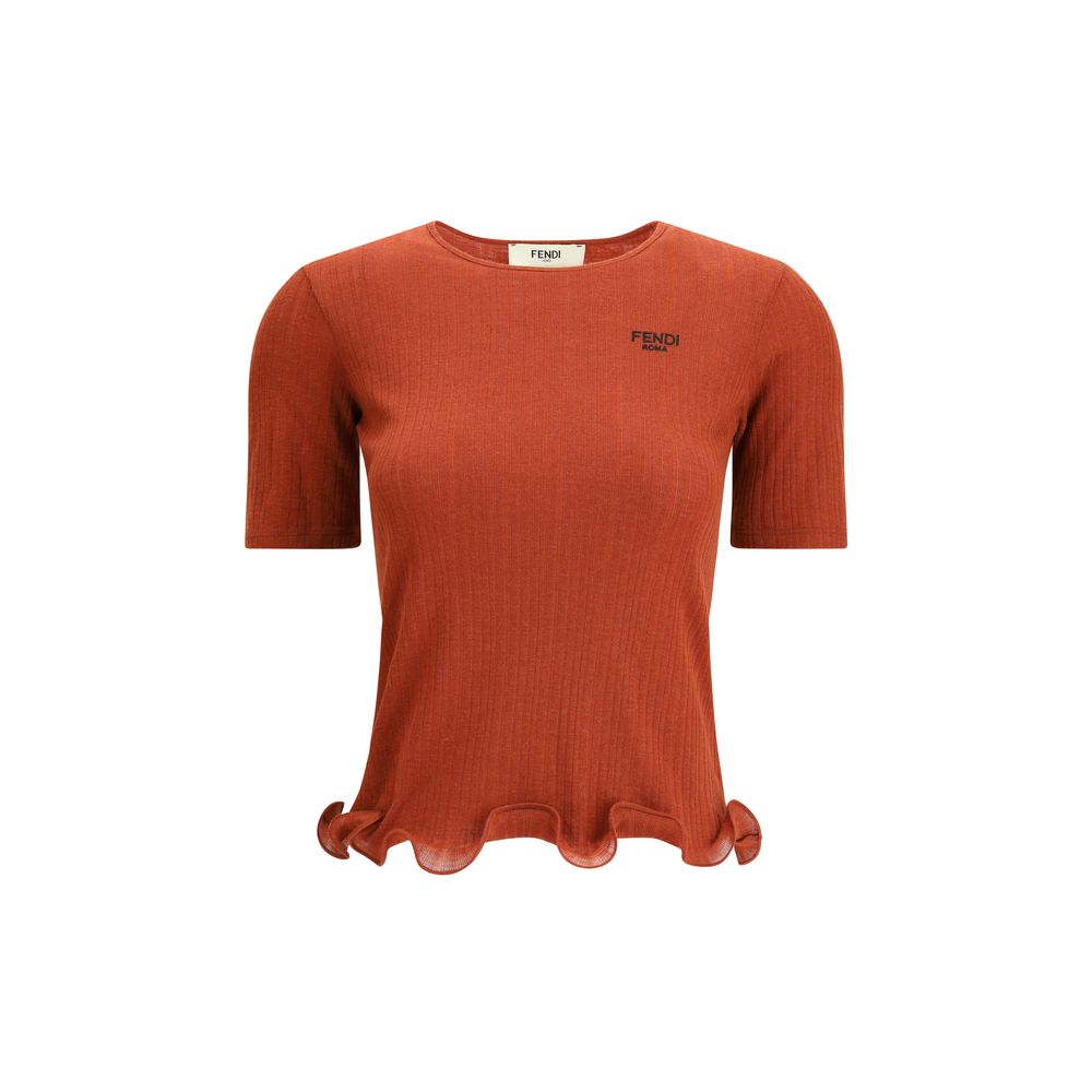 Red Fleece Wool TopThe short-sleeved Virgin Wool Top by Fendi is an essential piece that combines refined simplicity with iconic details. Made from ribbed Virgin Wool, it features a fitted cut with a classic crewneck, enhancing the silhouette with minimal