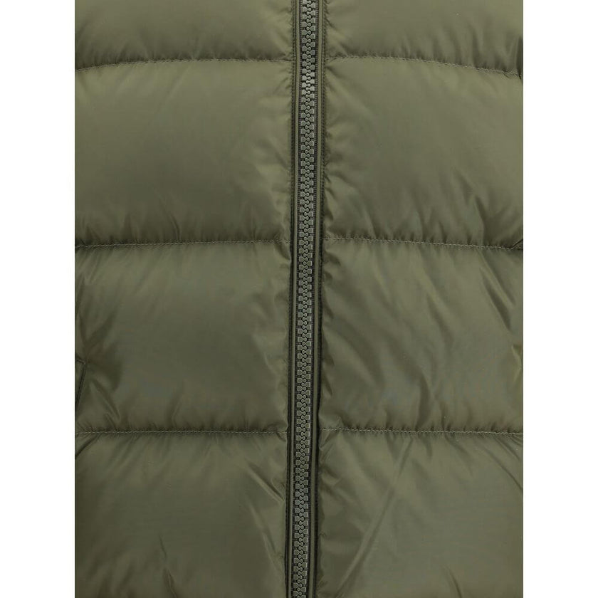 Maya Down JacketMaya Down Jacket by Moncler with adjustable drawstring hood and removable thanks to practical buttons. The high collar ensures protection, while the front closure with double slider zip guarantees functionality and comfort. It has two side