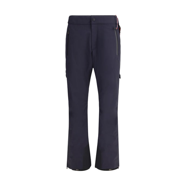 Blue Polyester Athletic PantsThe padded ski Pants by Moncler Grenoble embody the perfect balance between technical performance and contemporary style. Crafted from technical Nylon with a fleece lining, they provide warmth and comfort on mountain days. The