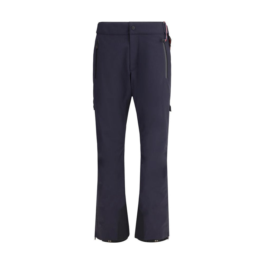 Blue Polyester Athletic PantsThe padded ski Pants by Moncler Grenoble embody the perfect balance between technical performance and contemporary style. Crafted from technical Nylon with a fleece lining, they provide warmth and comfort on mountain days. The