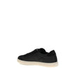 Black Leather Low Top SneakersLeather Sneakers by Prada combine contemporary style with everyday comfort. Featuring a flat rubber sole and round toe, they are distinguished by the iconic triangular side-applied plaque and tone-on-tone logo on the back, ad