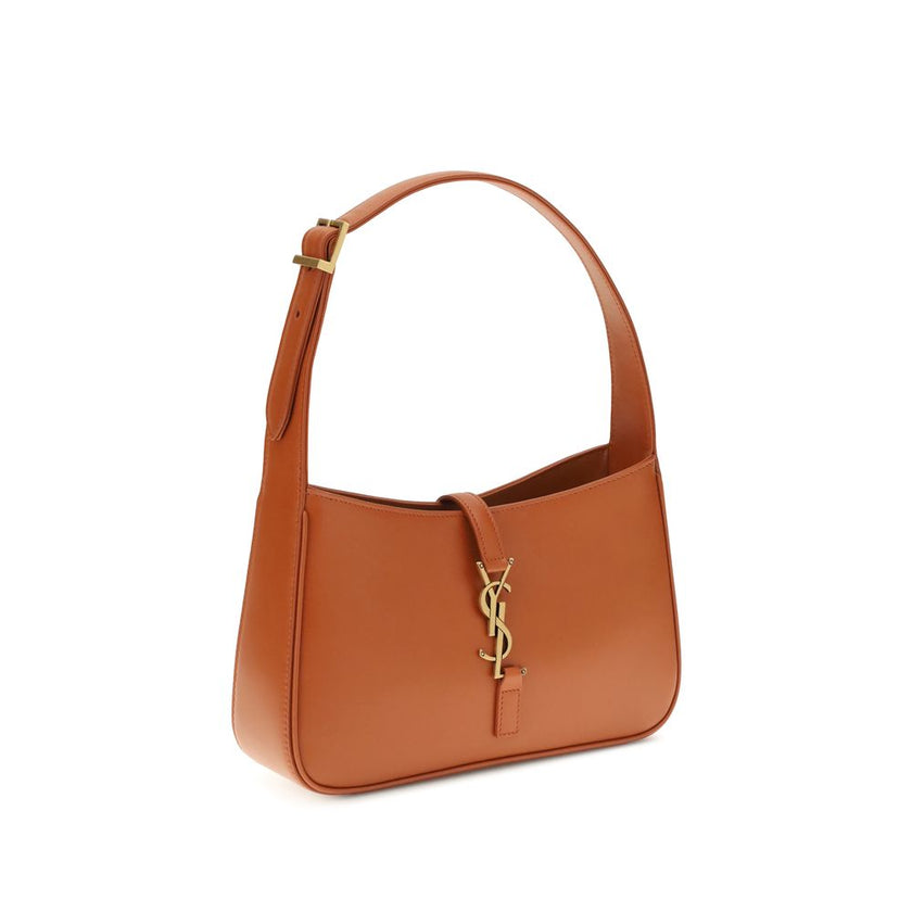 Orange Calf Leather Bos Taurus Shoulder BagThe Leather Hobo Shoulder Bag by Saint Laurent is an essential and refined model made of smooth leather with an elegant finish. Featuring a single adjustable top handle with buckle, it is distinguished by the int