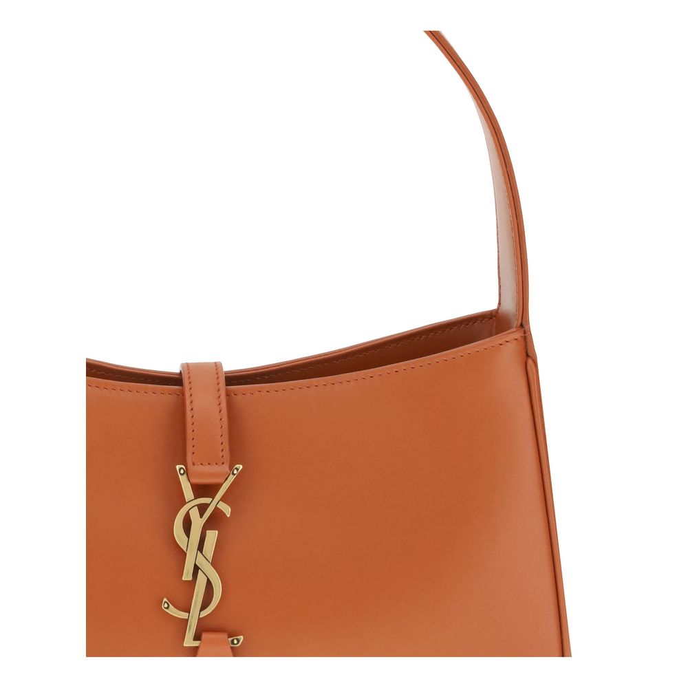 Orange Calf Leather Bos Taurus Shoulder BagThe Leather Hobo Shoulder Bag by Saint Laurent is an essential and refined model made of smooth leather with an elegant finish. Featuring a single adjustable top handle with buckle, it is distinguished by the int