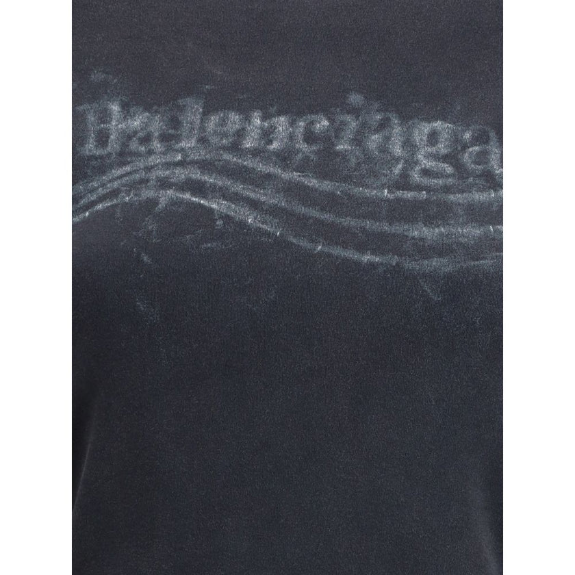 Black Cotton SportswearThe Washed Crayon Political Double-Sleeve T-Shirt by Balenciaga reimagines layering through a refined trompe-l’œil effect. Crafted from stretch interlock jersey with a washed finish, it mimics a short-sleeve tee layered over a long-