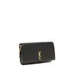 Black Calf Leather Bos Taurus Shoulder BagThe Cassandre Smartphone Case by Saint Laurent is a stylish and functional accessory, featuring a front flap decorated with the iconic YSL initials in gold metal. Equipped with a leather and chain shoulder strap,