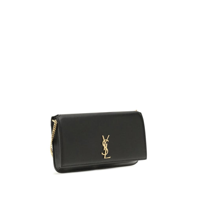 Black Calf Leather Bos Taurus Shoulder BagThe Cassandre Smartphone Case by Saint Laurent is a stylish and functional accessory, featuring a front flap decorated with the iconic YSL initials in gold metal. Equipped with a leather and chain shoulder strap,