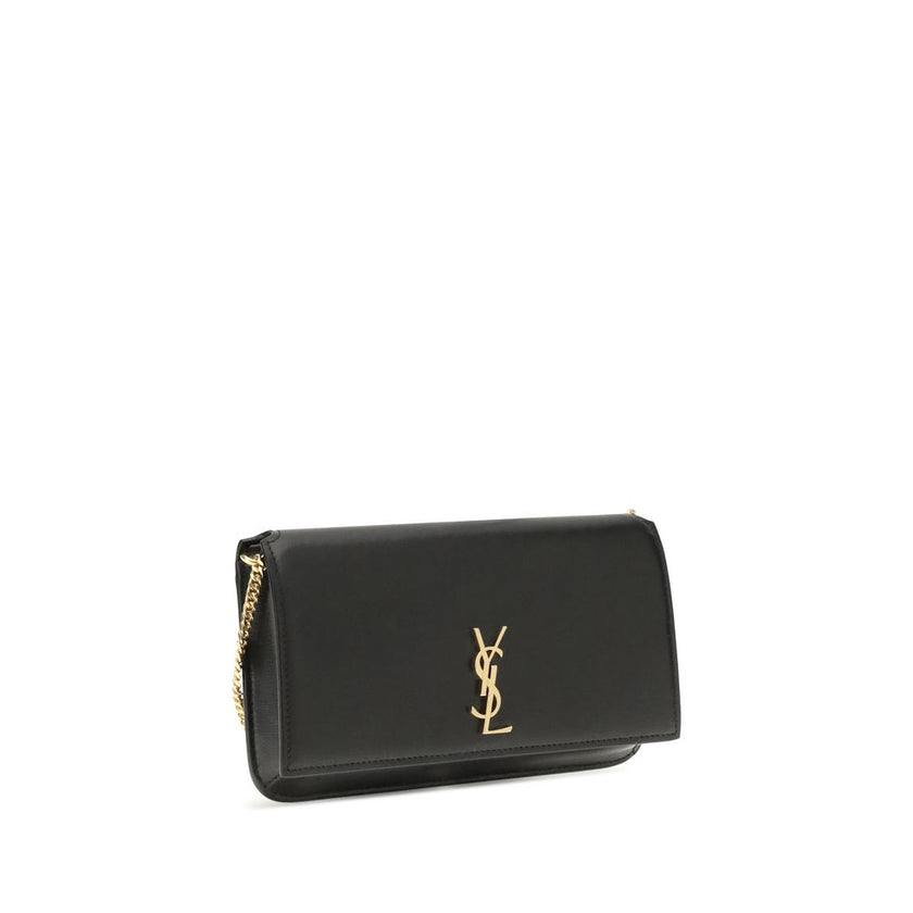 Black Calf Leather Bos Taurus Shoulder BagThe Cassandre Smartphone Case by Saint Laurent is a stylish and functional accessory, featuring a front flap decorated with the iconic YSL initials in gold metal. Equipped with a leather and chain shoulder strap,