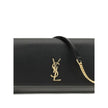 Black Calf Leather Bos Taurus Shoulder BagThe Cassandre Smartphone Case by Saint Laurent is a stylish and functional accessory, featuring a front flap decorated with the iconic YSL initials in gold metal. Equipped with a leather and chain shoulder strap,