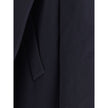 Hooded Short CoatThe hooded short Coat by Balenciaga blends tailored refinement with the brand’s contemporary edge. Crafted from dark navy brushed wool, it features a structured cut enhanced by shoulder pads and peak lapels, giving the silhouette a bold p