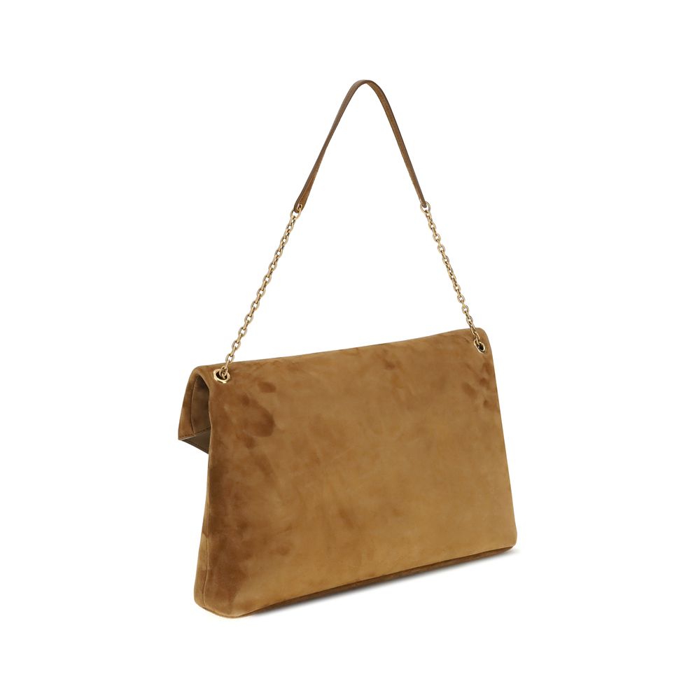 Beige Calf Leather Bos Taurus Shoulder BagThe Cassandre Shoulder Bag by Saint Laurent is an extra-large suede clutch with a sleek and contemporary design. Featuring a stowable cable chain and metallic CASSANDRE decoration, it can be worn on the shoulder o