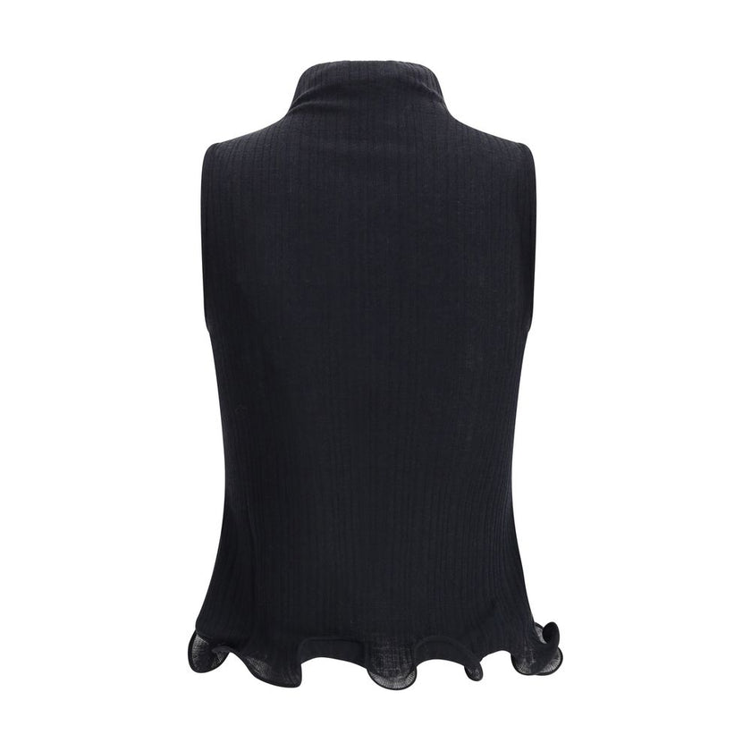 Black Wool TopThe sleeveless Virgin Wool Top by Fendi is a timeless piece that blends refined simplicity with iconic details. Crafted from ribbed Virgin Wool, it features a fitted silhouette with a high neck, enhancing the figure with understated elegance