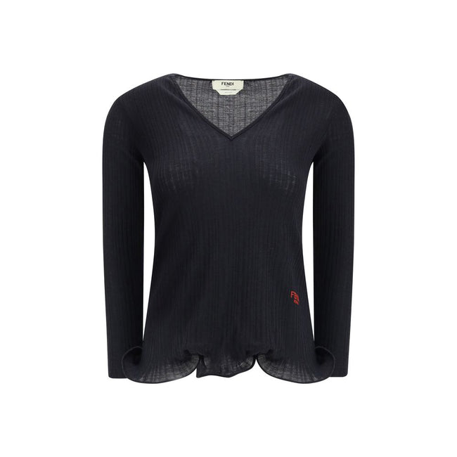 Black Fleece Wool TopThe long-sleeved Virgin Wool top by Fendi is an essential piece that combines refined simplicity with iconic details. Crafted from ribbed virgin wool, it features a fitted cut with a V-neckline, enhancing the silhouette with minimal e