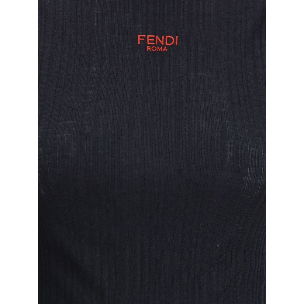 Black Wool TopThe sleeveless Virgin Wool Top by Fendi is a timeless piece that blends refined simplicity with iconic details. Crafted from ribbed Virgin Wool, it features a fitted silhouette with a high neck, enhancing the figure with understated elegance