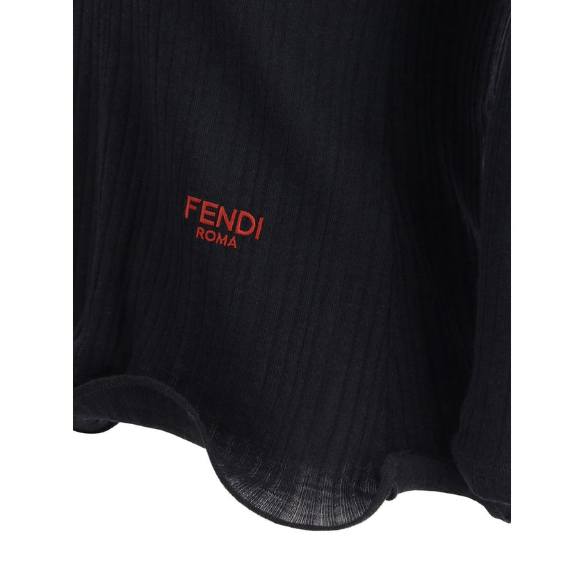 Black Fleece Wool TopThe long-sleeved Virgin Wool top by Fendi is an essential piece that combines refined simplicity with iconic details. Crafted from ribbed virgin wool, it features a fitted cut with a V-neckline, enhancing the silhouette with minimal e