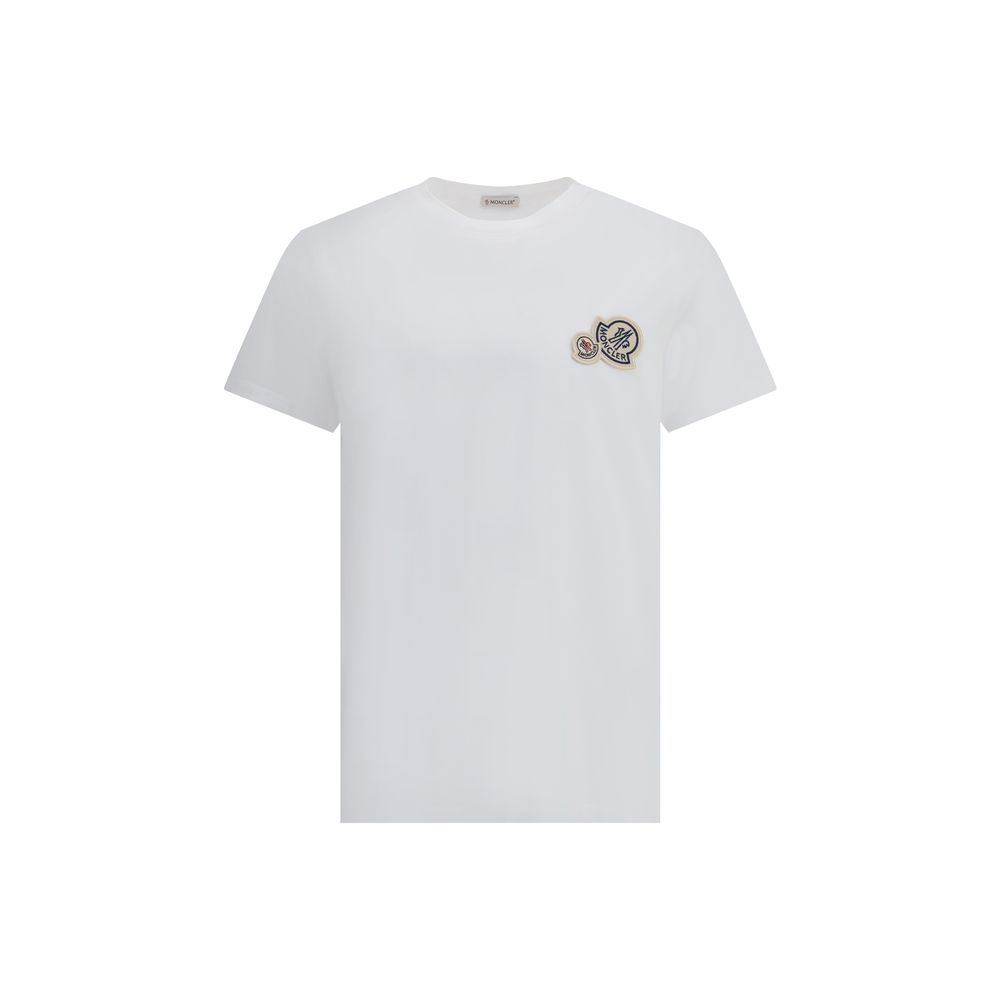 White Cotton T-ShirtThis soft cotton jersey T-shirt from Moncler features a ribbed crew neck and regular fit. The essential design is enhanced by the logo patch applied to the chest for an iconic and recognizable touch. A versatile garment ideal for compl