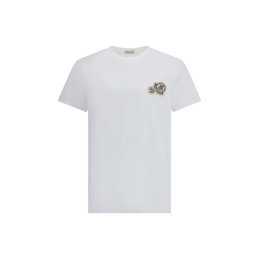 White Cotton T-ShirtThis soft cotton jersey T-shirt from Moncler features a ribbed crew neck and regular fit. The essential design is enhanced by the logo patch applied to the chest for an iconic and recognizable touch. A versatile garment ideal for compl