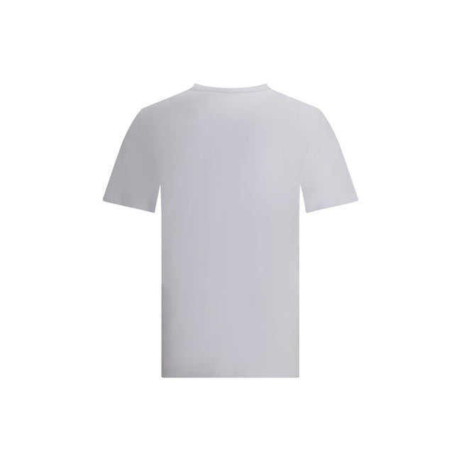 Logo T-ShirtMoncler’s T-Shirt combines simplicity and recognition in an essential design. The classic crew neck ensures comfort, while the iconic contrasting signature on the front and logo patch add a distinctive touch, perfect for a casual yet polished