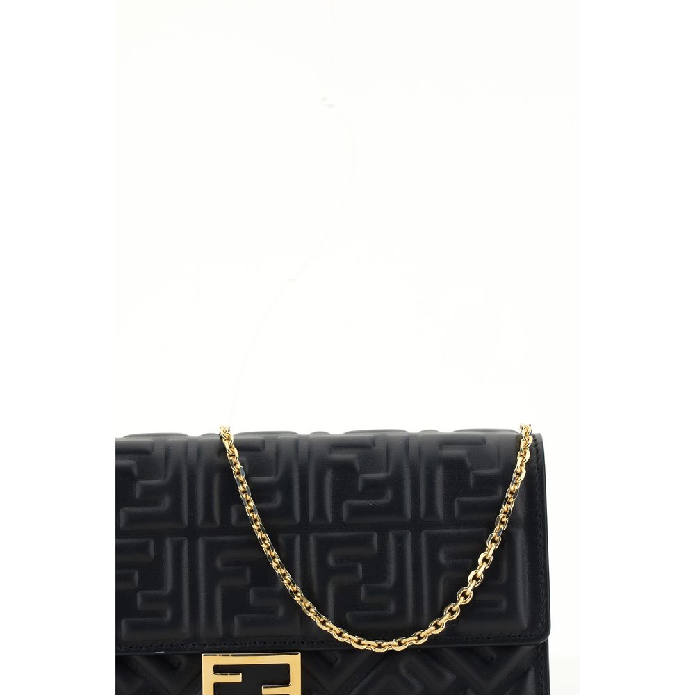 Black Calf Leather Bos Taurus WalletThe Matisse Chain Wallet by Fendi is an elegant and practical accessory. Made of leather, it features a gold chain for carrying it by hand, adding a touch of luxury. The front closure is with magnetic flap, while the th
