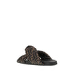 Satin Slide SandalsFendi’s Satin Slide Sandals combine elegance and comfort with their flat sole and silk upper, decorated with the brand’s distinctive FF pattern. The application of a gold Fendi signature ring adds a touch of luxury and sophistication. T