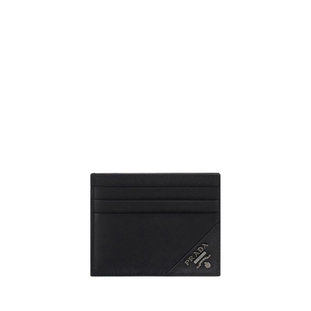 Black Calf Leather Bos Taurus WalletPrada’s leather credit Card Holder is a compact and elegant accessory with six card slots distributed on the front and back. It is embellished with a blue leather detail with a metal plaque and logo on the front, while