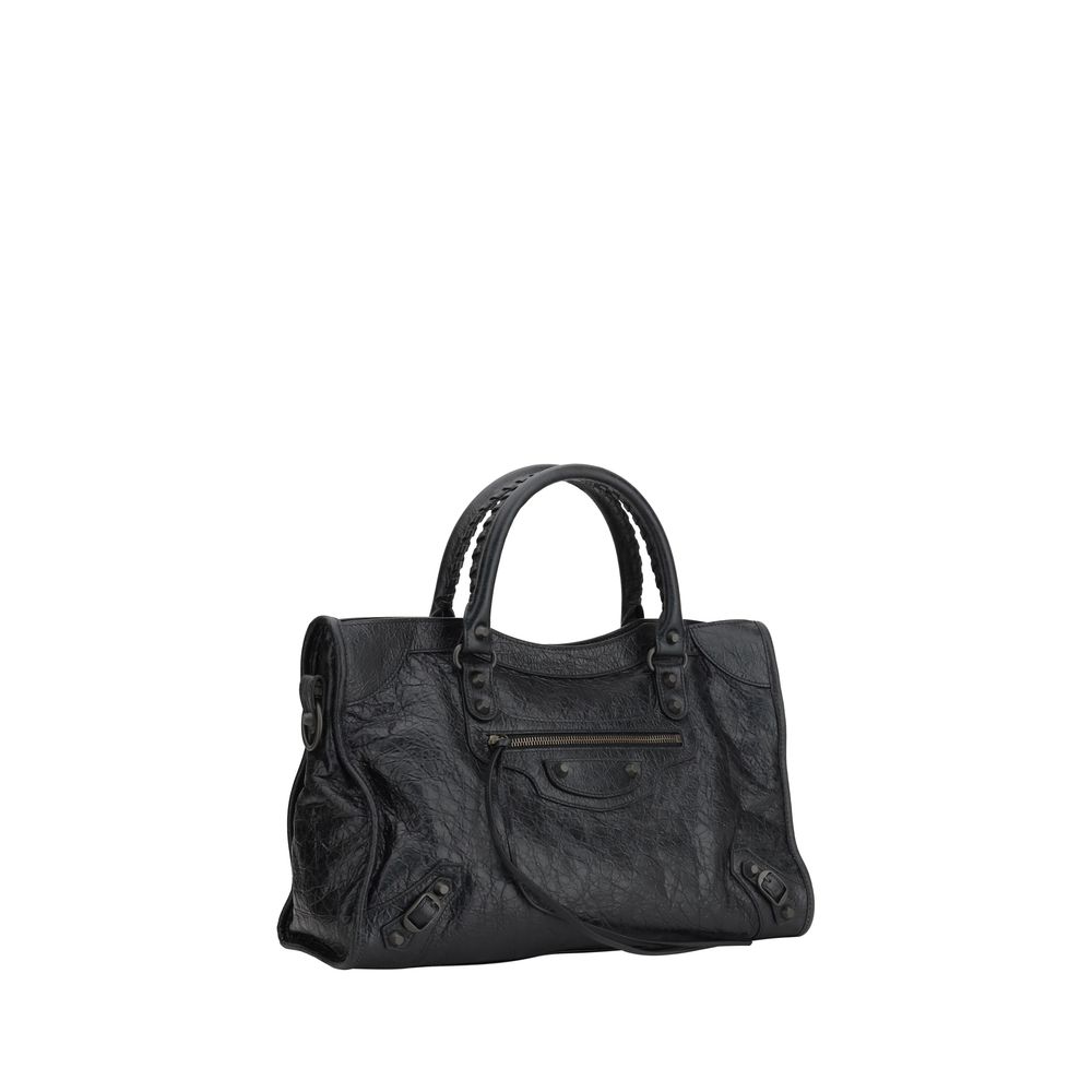 Black Calf Leather Bos Taurus Shoulder BagBalenciaga’s Le City Medium Shoulder Bag is a high-class item made of fine lambskin leather that combines elegance and functionality. The two hand-woven leather handles lend an artisanal and refined touch, while t
