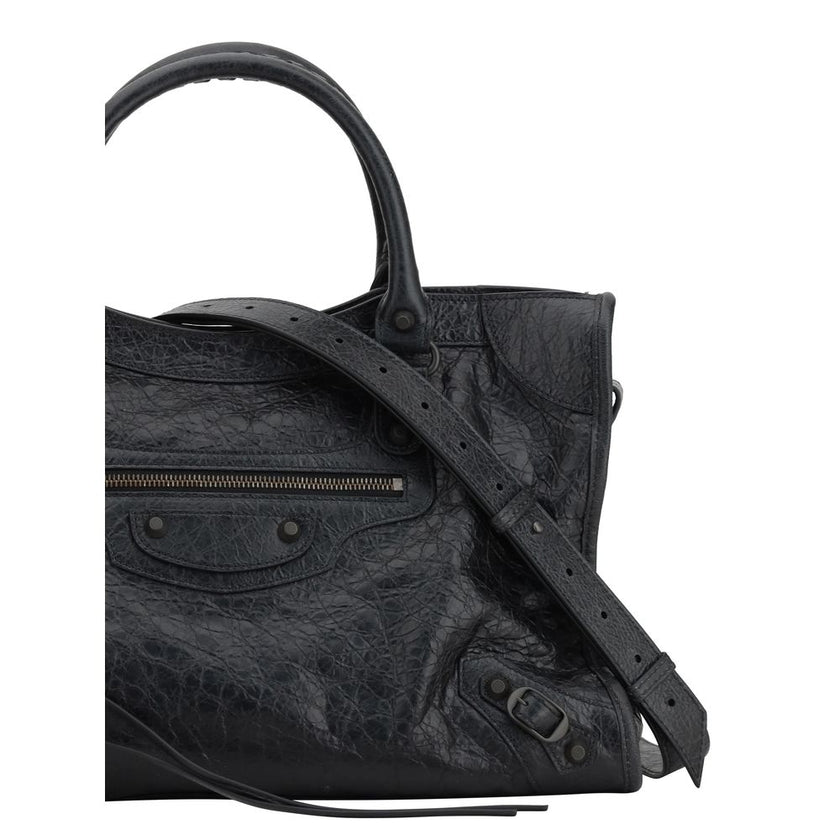 Black Calf Leather Bos Taurus Shoulder BagBalenciaga’s Le City Medium Shoulder Bag is a high-class item made of fine lambskin leather that combines elegance and functionality. The two hand-woven leather handles lend an artisanal and refined touch, while t