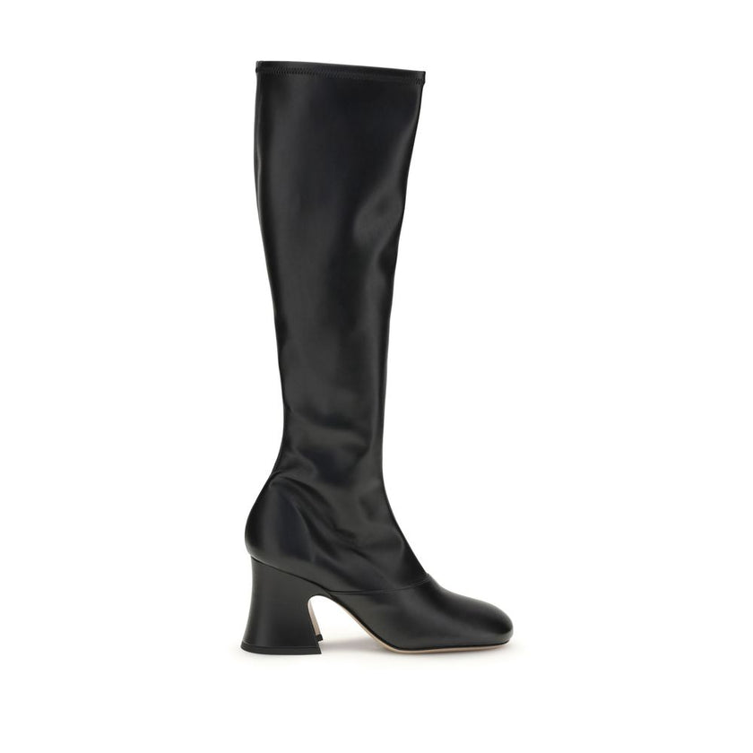 Black Leather High Heel BootsThe Janis heeled boots by Chloé are crafted from soft stretch fabric with a leather-effect finish, providing a second-skin fit. Featuring a stacked bell heel, they combine a high tubular design with a slightly squared toe for