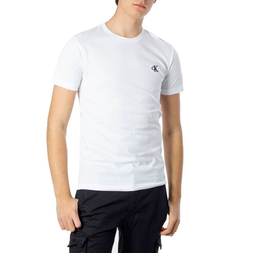 White Cotton ClothingDiscover the elegance and comfort of the Calvin Klein Jeans ESSENTIAL SLIM TEE J30J314544 short-sleeve t-shirt for men. Made from 100% cotton, this shirt offers a soft and breathable feel, making it perfect for everyday wear. The slim