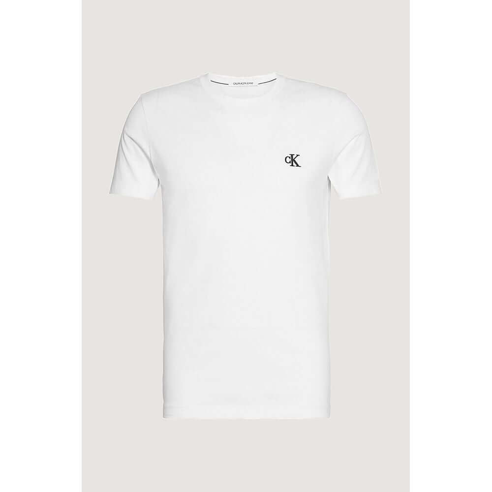 White Cotton ClothingDiscover the elegance and comfort of the Calvin Klein Jeans ESSENTIAL SLIM TEE J30J314544 short-sleeve t-shirt for men. Made from 100% cotton, this shirt offers a soft and breathable feel, making it perfect for everyday wear. The slim