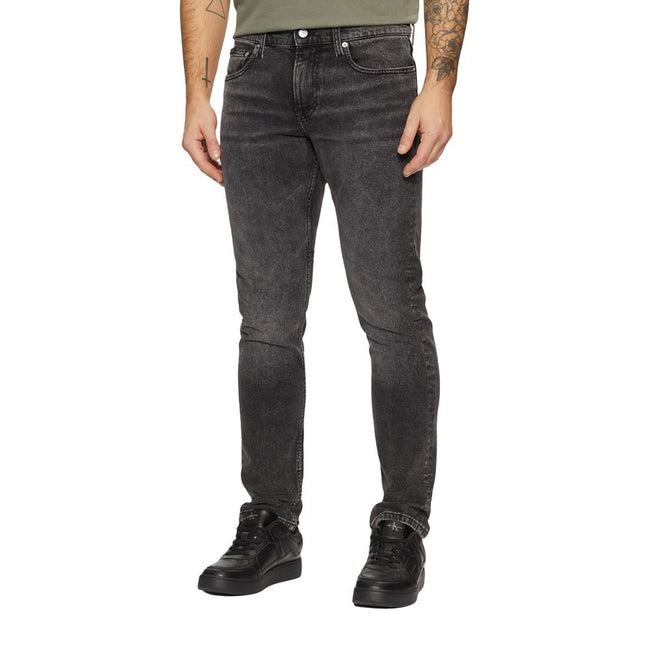 Gray Cotton Skinny JeansDiscover the Calvin Klein Jeans SLIM J30J326520 men’s slim fit jeans, crafted from high-quality materials: 94% cotton, 4% elastomultiester, and 2% elastane/lycra. These jeans offer a modern, tapered fit that is perfect for a stylis