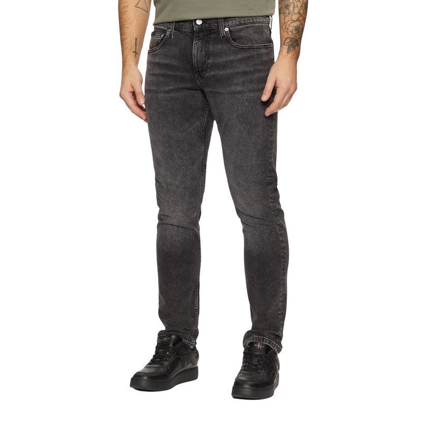 Gray Cotton Skinny JeansDiscover the Calvin Klein Jeans SLIM J30J326520 men’s slim fit jeans, crafted from high-quality materials: 94% cotton, 4% elastomultiester, and 2% elastane/lycra. These jeans offer a modern, tapered fit that is perfect for a stylis