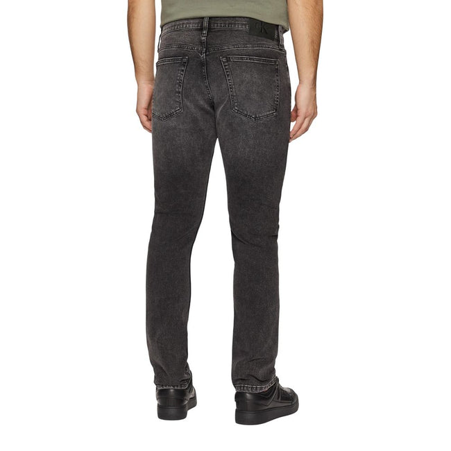 Gray Cotton Skinny JeansDiscover the Calvin Klein Jeans SLIM J30J326520 men’s slim fit jeans, crafted from high-quality materials: 94% cotton, 4% elastomultiester, and 2% elastane/lycra. These jeans offer a modern, tapered fit that is perfect for a stylis