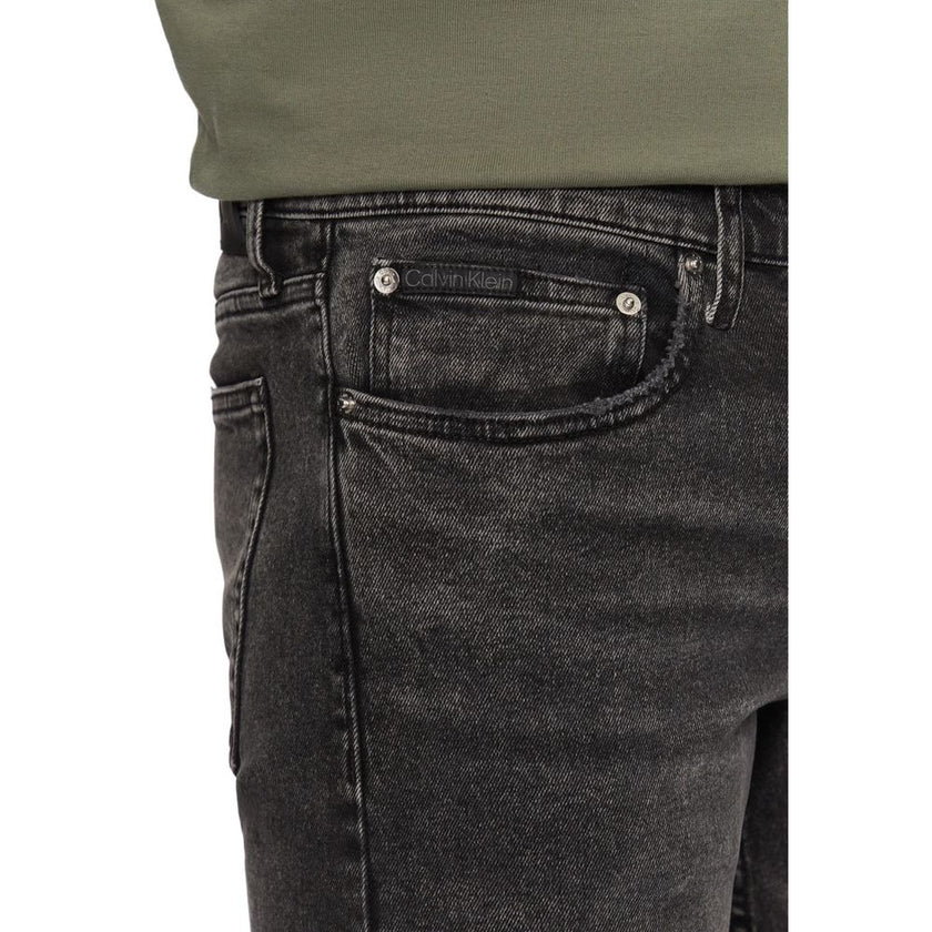 Gray Cotton Skinny JeansDiscover the Calvin Klein Jeans SLIM J30J326520 men’s slim fit jeans, crafted from high-quality materials: 94% cotton, 4% elastomultiester, and 2% elastane/lycra. These jeans offer a modern, tapered fit that is perfect for a stylis