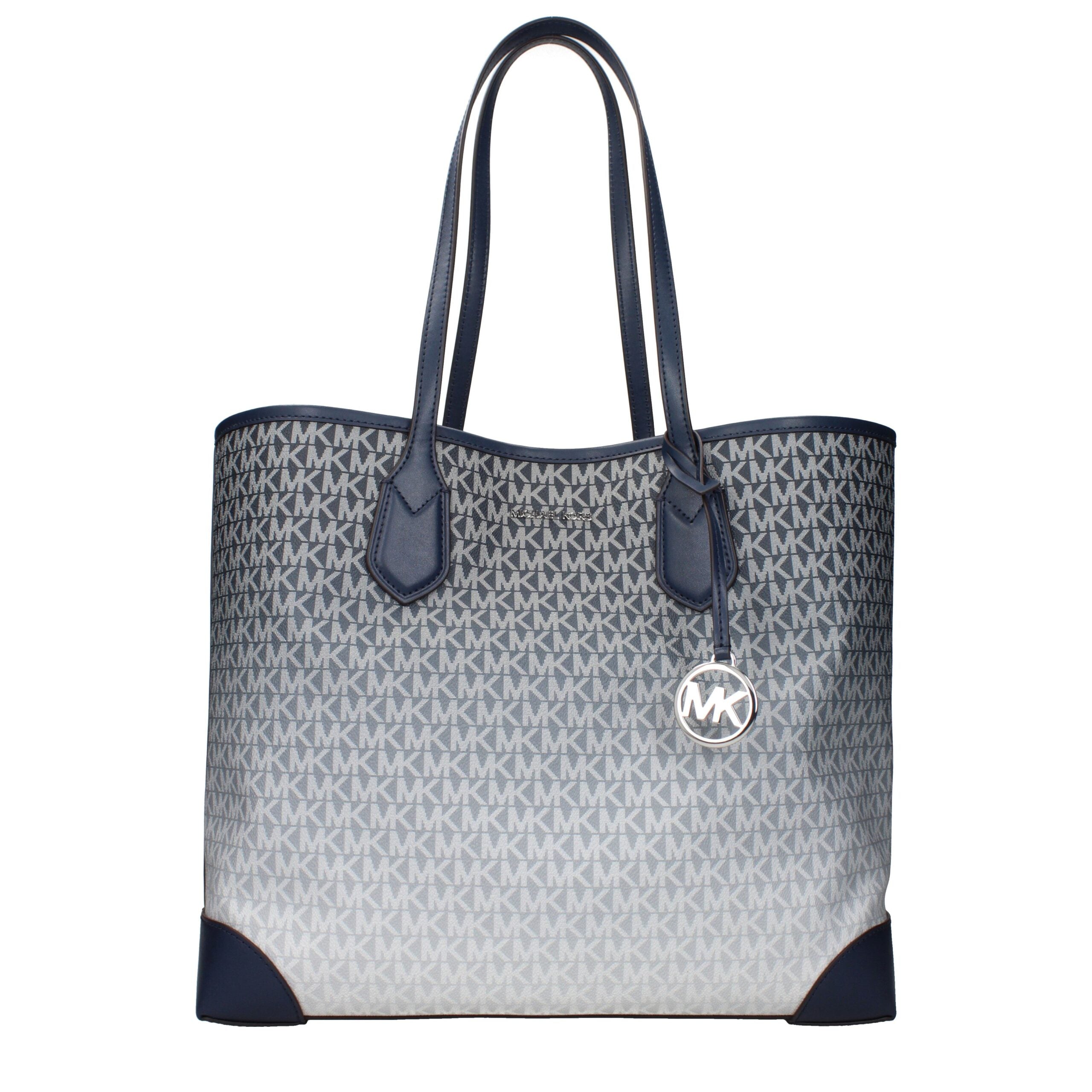 Blue Fabric Shoulder BagDescription: The product with MPN 35R5SV0T7BNAVY and code F85025 fabric in blue is a shoulder bags designed by Michael Kors. It has features like logo, front detail, removable details, removable inner clutch.Blue Fabric Shoulder Ba