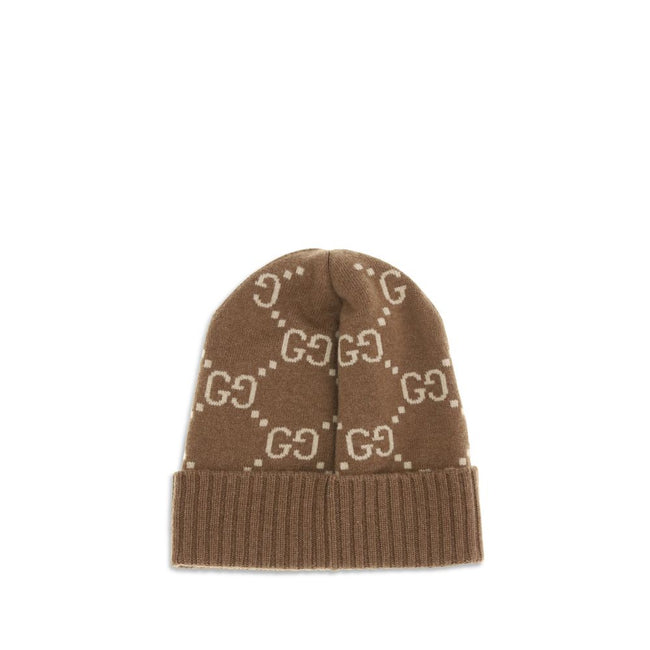 Brown Cashmere BeanieCashmere GG Hat by Gucci features a ribbed lapel and all-over GG logo print, combining elegance and comfort in an iconic and refined accessory. Season: AW25 Composition: 100% Kashmir/capra Hircus MADE IN ITALYBrown Cashmere Beanie${ta