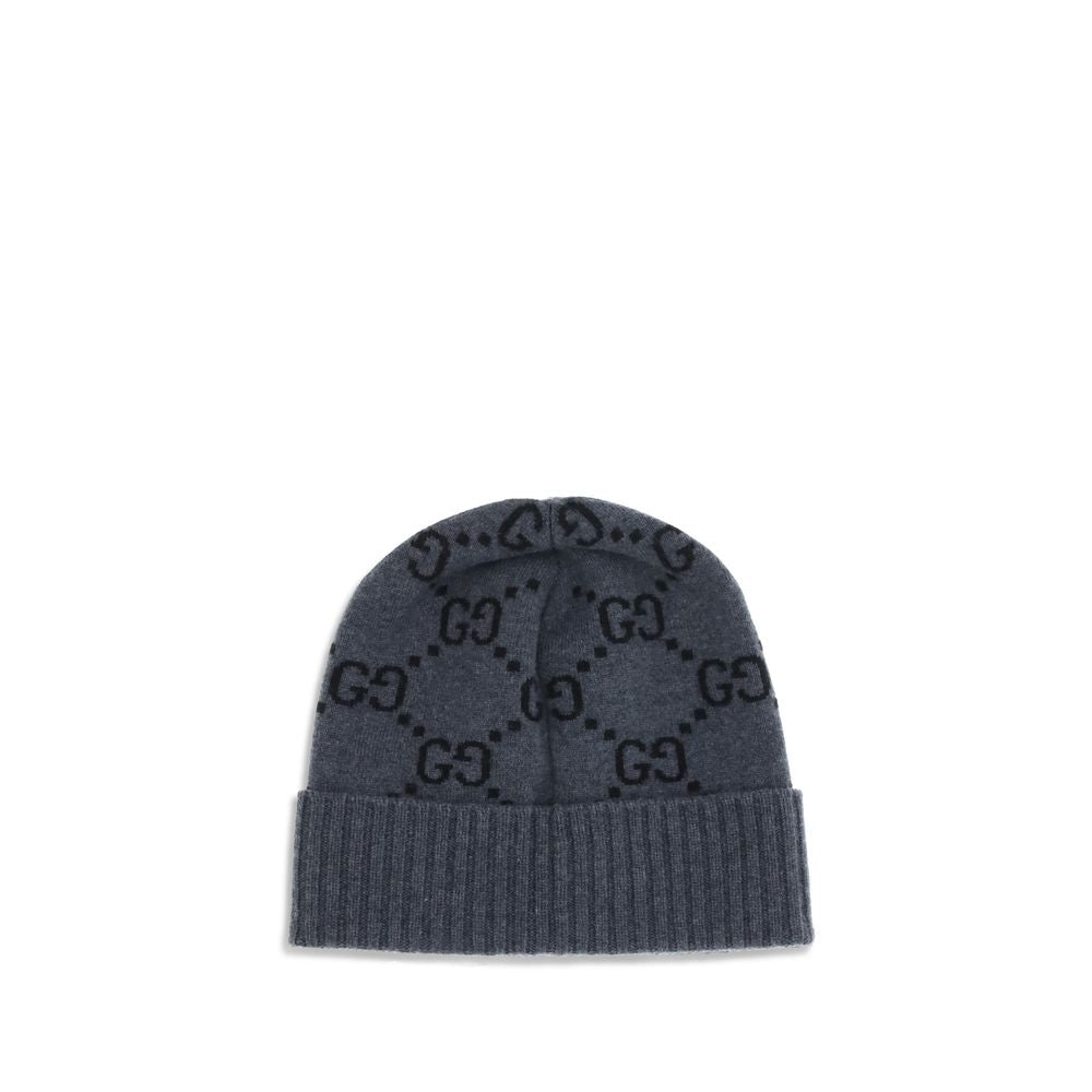 Gray Cashmere BeanieCashmere GG Hat by Gucci features a ribbed lapel and all-over GG logo print, combining elegance and comfort in an iconic and refined accessory. Season: AW25 Composition: 100% Kashmir/capra Hircus MADE IN ITALYGray Cashmere Beanie${tags