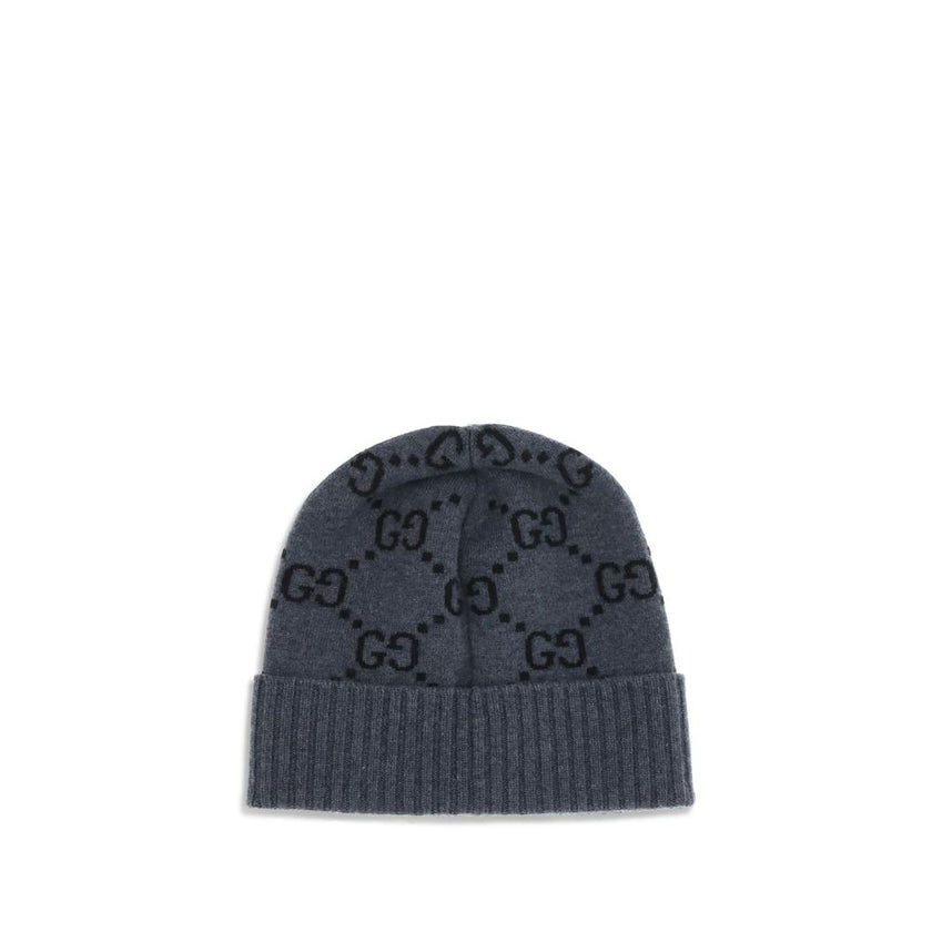 Gray Cashmere BeanieCashmere GG Hat by Gucci features a ribbed lapel and all-over GG logo print, combining elegance and comfort in an iconic and refined accessory. Season: AW25 Composition: 100% Kashmir/capra Hircus MADE IN ITALYGray Cashmere Beanie${tags