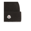 Black Wool BeanieThe beanie Hat by Moncler is crafted from a wool and cashmere blend with a brioche stitch that enhances its softness and style. The heavy knit ensures warmth and comfort, while the iconic felt patch on the front adds a distinctive and rec