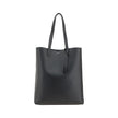 Black Calf Leather Bos Taurus HandbagThe Saint Laurent leather Tote Bag is a high-class piece, featuring an elegant and practical design. The two top handles make it easy to carry both by hand and on the shoulder, while the iconic contrasting monogram on