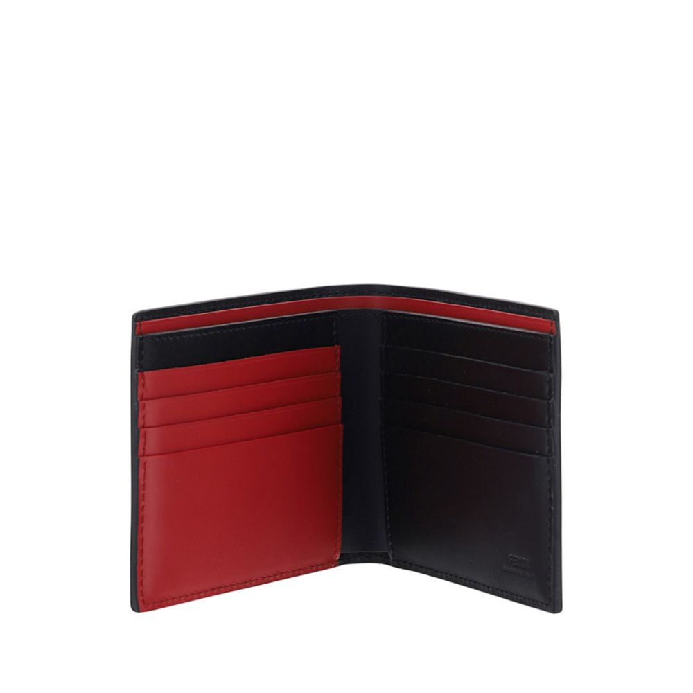 Black Calf Leather Bos Taurus WalletFendi’s billfold leather Wallet is an elegant and practical accessory perfect for those seeking style and functionality. The two-tone design lends a modern touch, while the brand’s iconic signature press-stamped on the