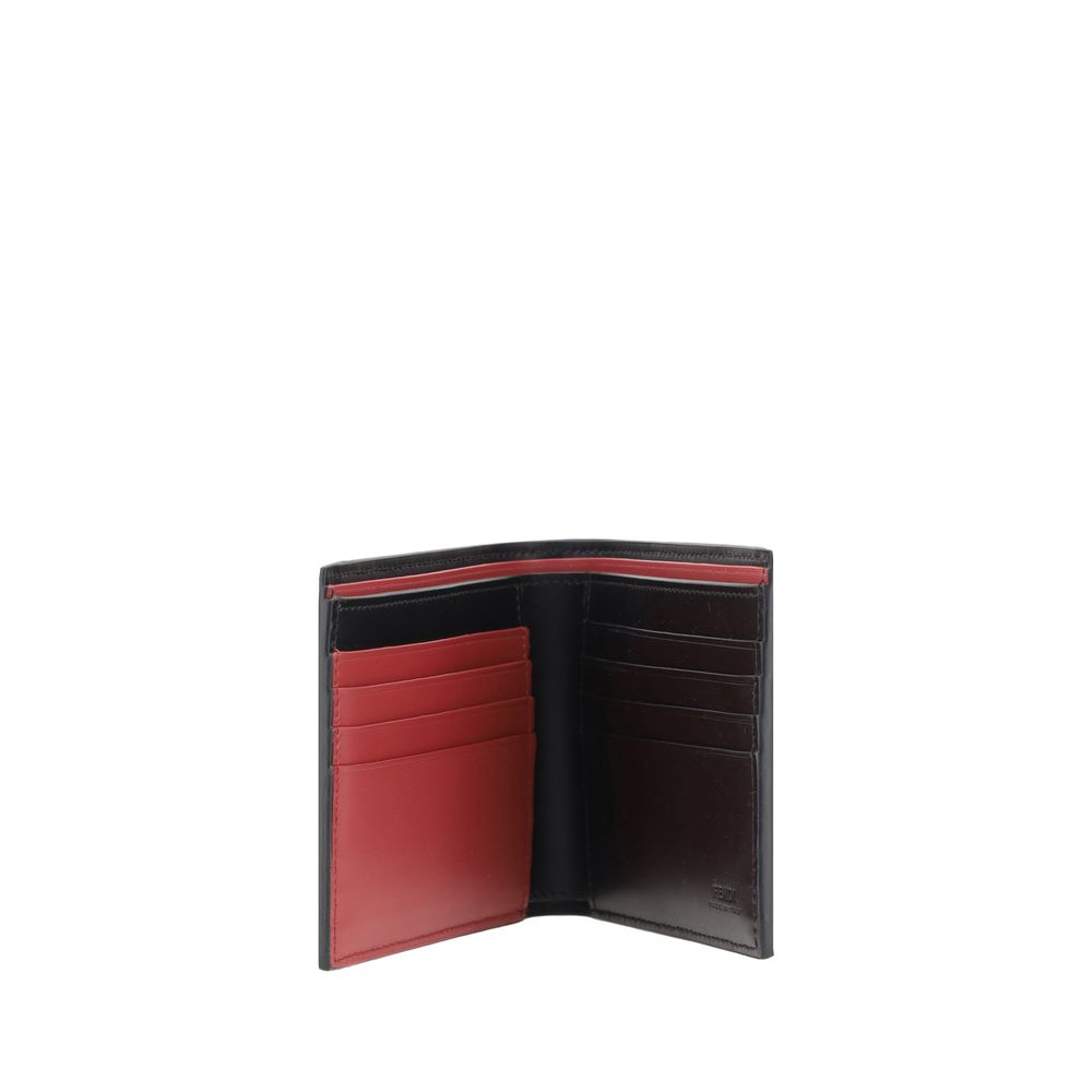 Black Calf Leather Bos Taurus WalletFendi’s billfold leather Wallet is an elegant and practical accessory perfect for those seeking style and functionality. The two-tone design lends a modern touch, while the brand’s iconic signature press-stamped on the