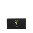 Black Calf Leather Bos Taurus WalletLeather Matellassè Wallet by Saint Laurent, gold brand logo on front, button closure on front, two compartments with one zip pocket, slots card, gold brand logo inside. Season: AW25 Dimension: 20x20x2 Composition: GENER