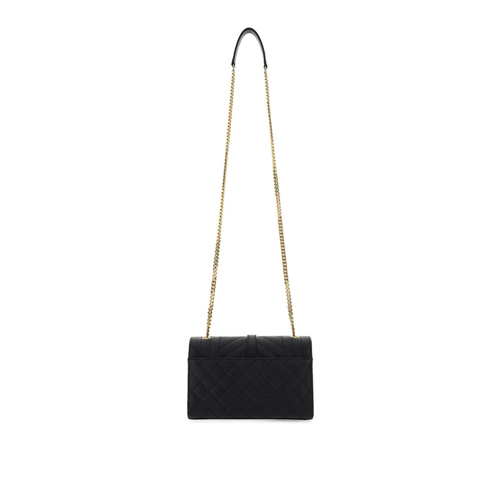 Black Calf Leather Bos Taurus Shoulder BagCalfskin Satchel Small Shoulder Bag by Saint Laurent, magnetic closure, monogram logo plaque, chain shoulder strap, matellassè texture, back flat pocket, internal flat pocket. Season: AW25 Dimension: 23x23x6 Compo