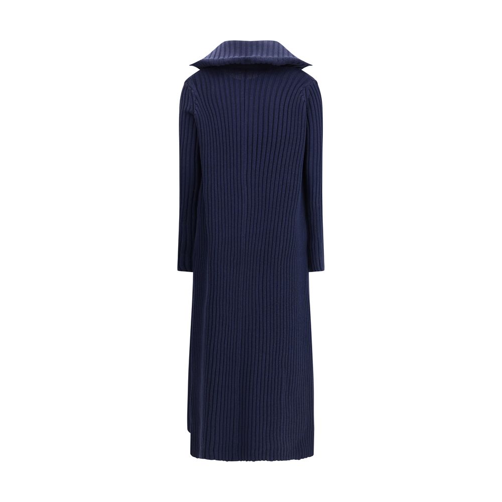Blue Polyester Full-Length JacketThe Ribbed Shawl-Collar Cardigan by Balenciaga embodies understated luxury with its elongated silhouette and distinctive textural depth. Crafted in ribbed knit, it wraps the body with fluid ease, while the generous shawl c
