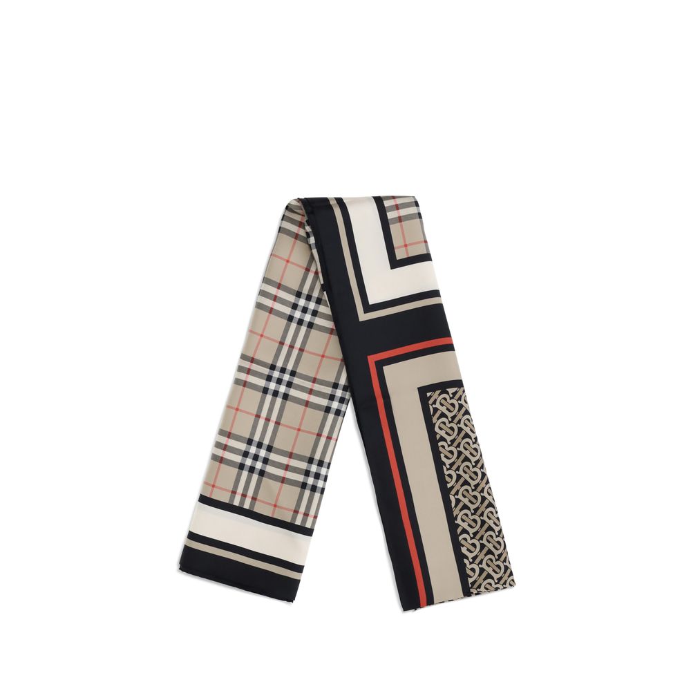 Beige Silk ScarfPrint collage silk Scarf by Burberry is made from Italian silk twill and features an elegant graphic composition. The digital print combines three iconic elements of the house: the Burberry Check motif, the Thomas Burberry monogram, and th