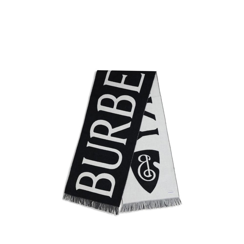 Black Wool ScarfWool logo Scarf by Burberry is a refined accessory with a graphic, contemporary style. Made in Italy from soft two-tone wool, it is decorated with Burberry lettering and the B Shield jacquard pattern, inspired by the iconic Equestrian Knig
