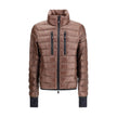 Brown Polyamide CoatThe Hers Jacket by Moncler Grenoble is a lightweight and functional piece designed to provide protection and practicality for any outdoor activity. Made from technical nylon, it features a high collar and a double-slider front zip with