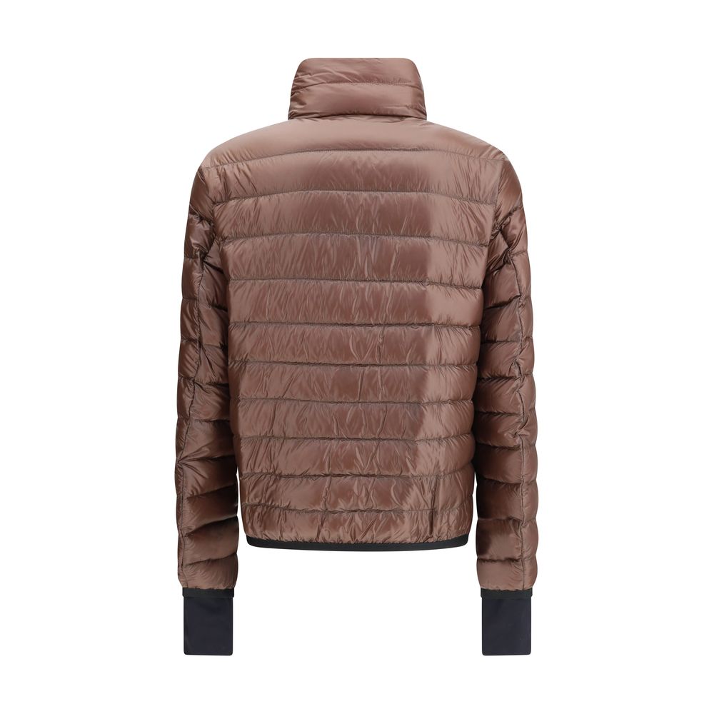 Brown Polyamide CoatThe Hers Jacket by Moncler Grenoble is a lightweight and functional piece designed to provide protection and practicality for any outdoor activity. Made from technical nylon, it features a high collar and a double-slider front zip with