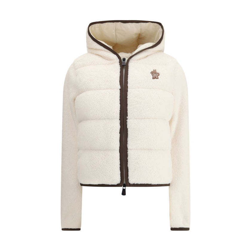 Padded Polartec® Zip-Up HoodieThe Moncler Grenoble Padded Polartec® Zip-Up Hoodie is designed for trekking and outdoor performance, blending function with comfort. Crafted from Polartec® High Loft™ stretch velour, it features a padded front and quilted de