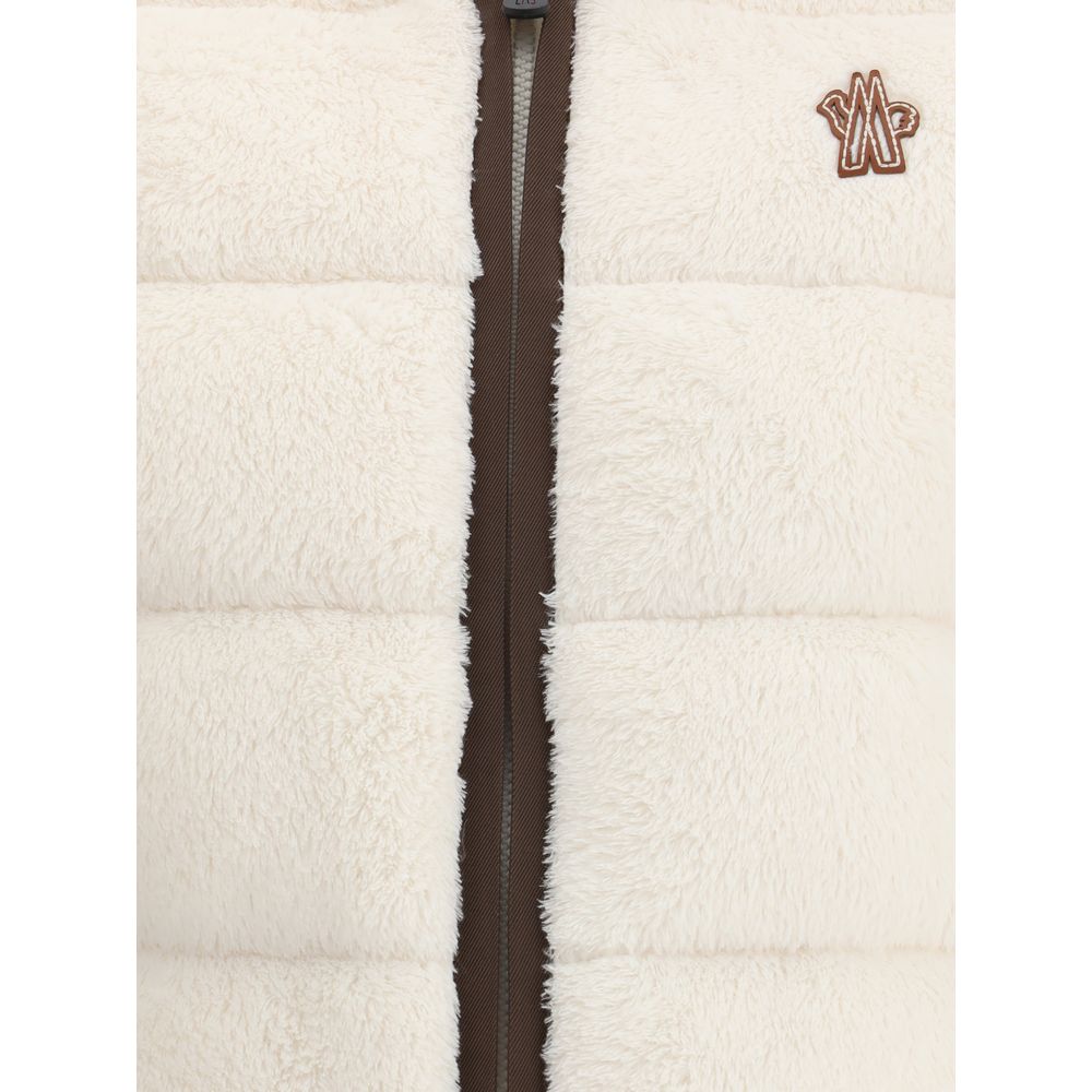 Padded Polartec® Zip-Up HoodieThe Moncler Grenoble Padded Polartec® Zip-Up Hoodie is designed for trekking and outdoor performance, blending function with comfort. Crafted from Polartec® High Loft™ stretch velour, it features a padded front and quilted de